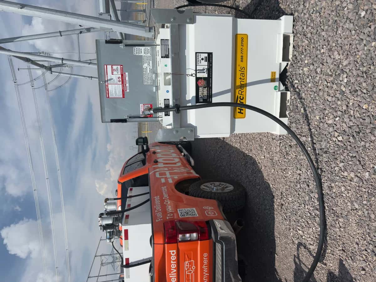 TopOff truck fueling rental construction equipment at a yard in Utah