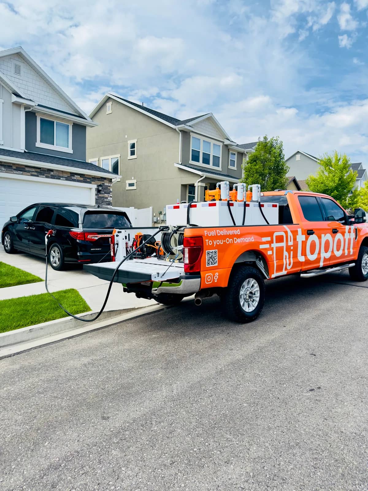 TopOff residential fuel delivery truck at Utah home driveway