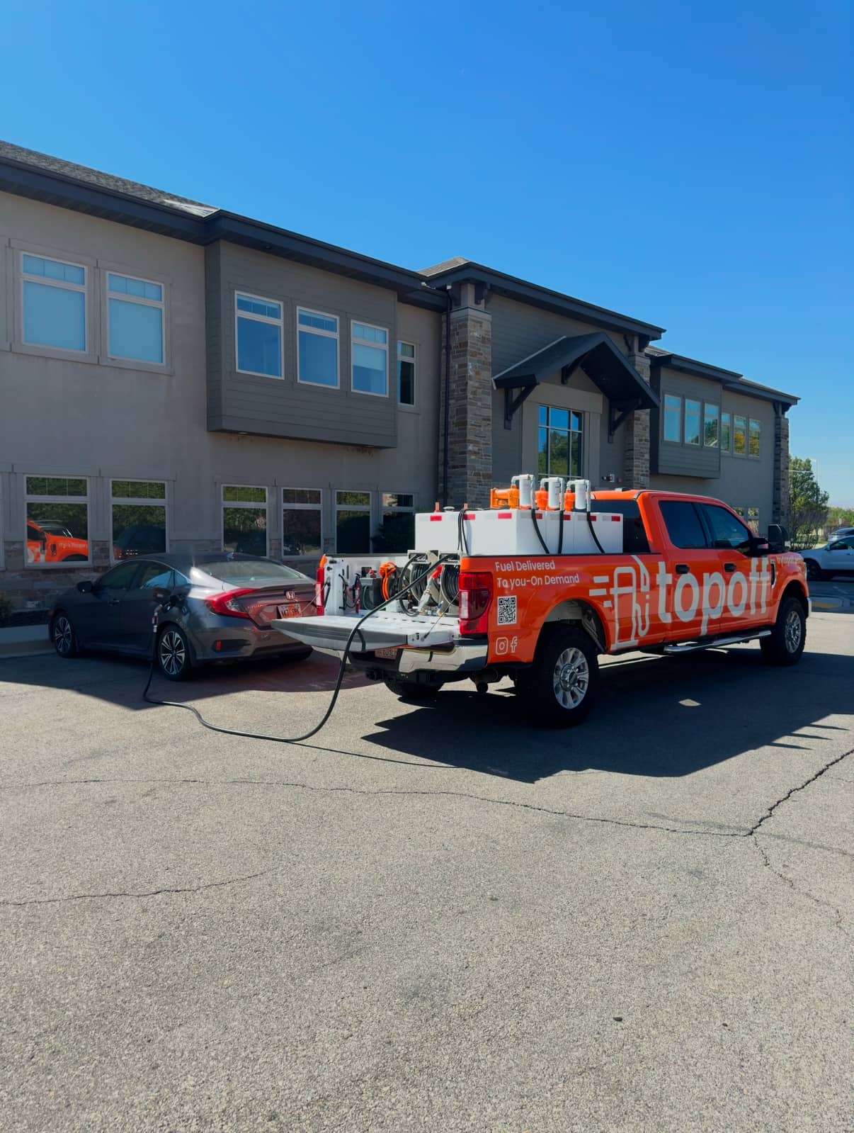 Fuel delivery at work office parking lot in Utah County