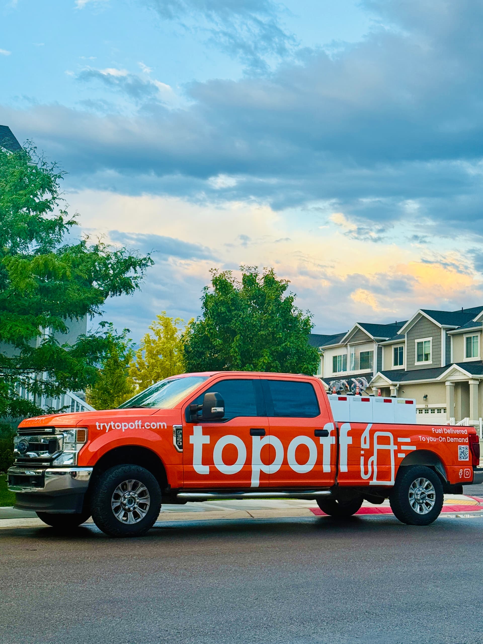 TopOff truck parked at a home for free fuel delivery