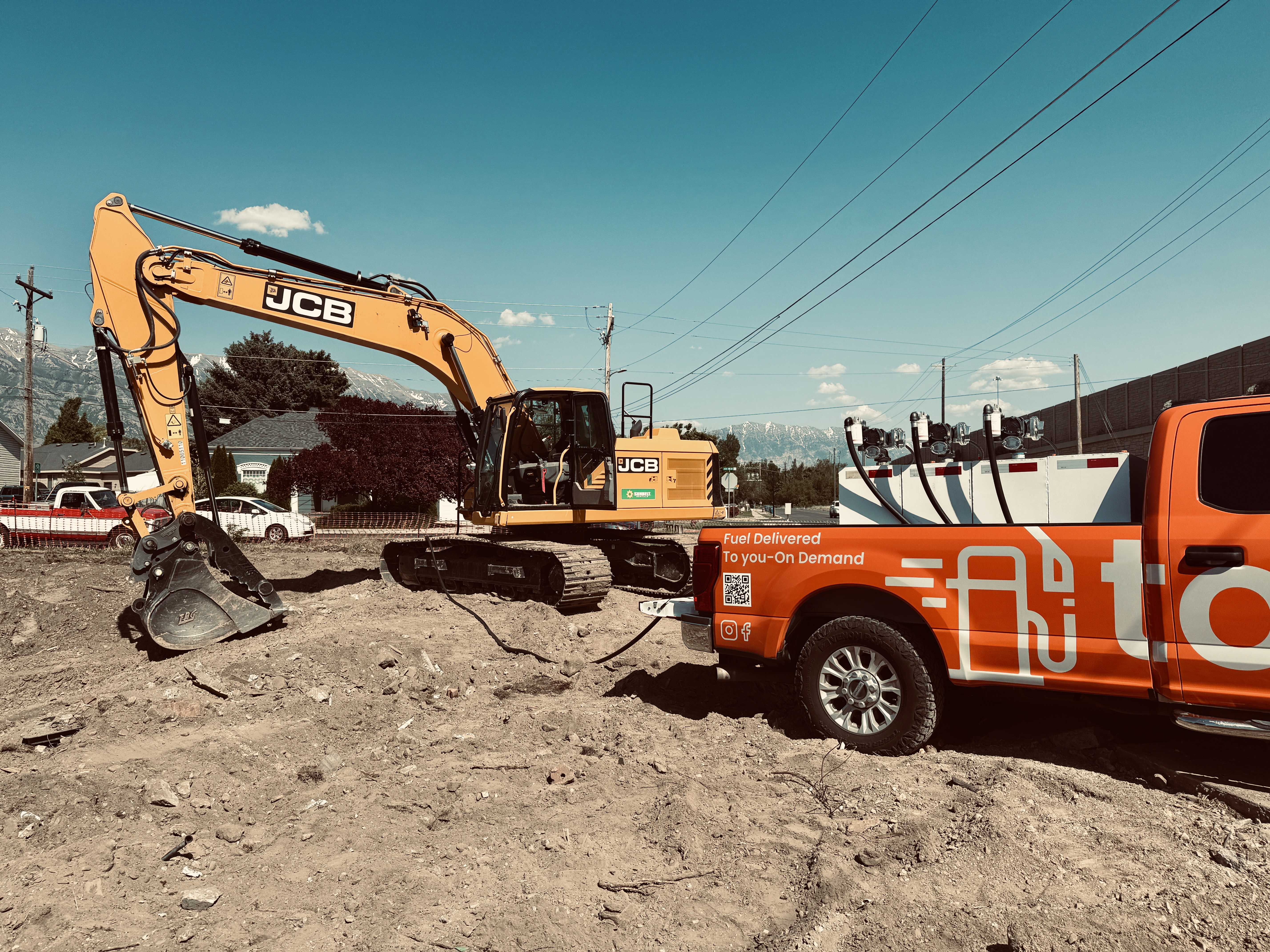 Mobile fueling service delivering diesel to construction equipment at job site in Utah