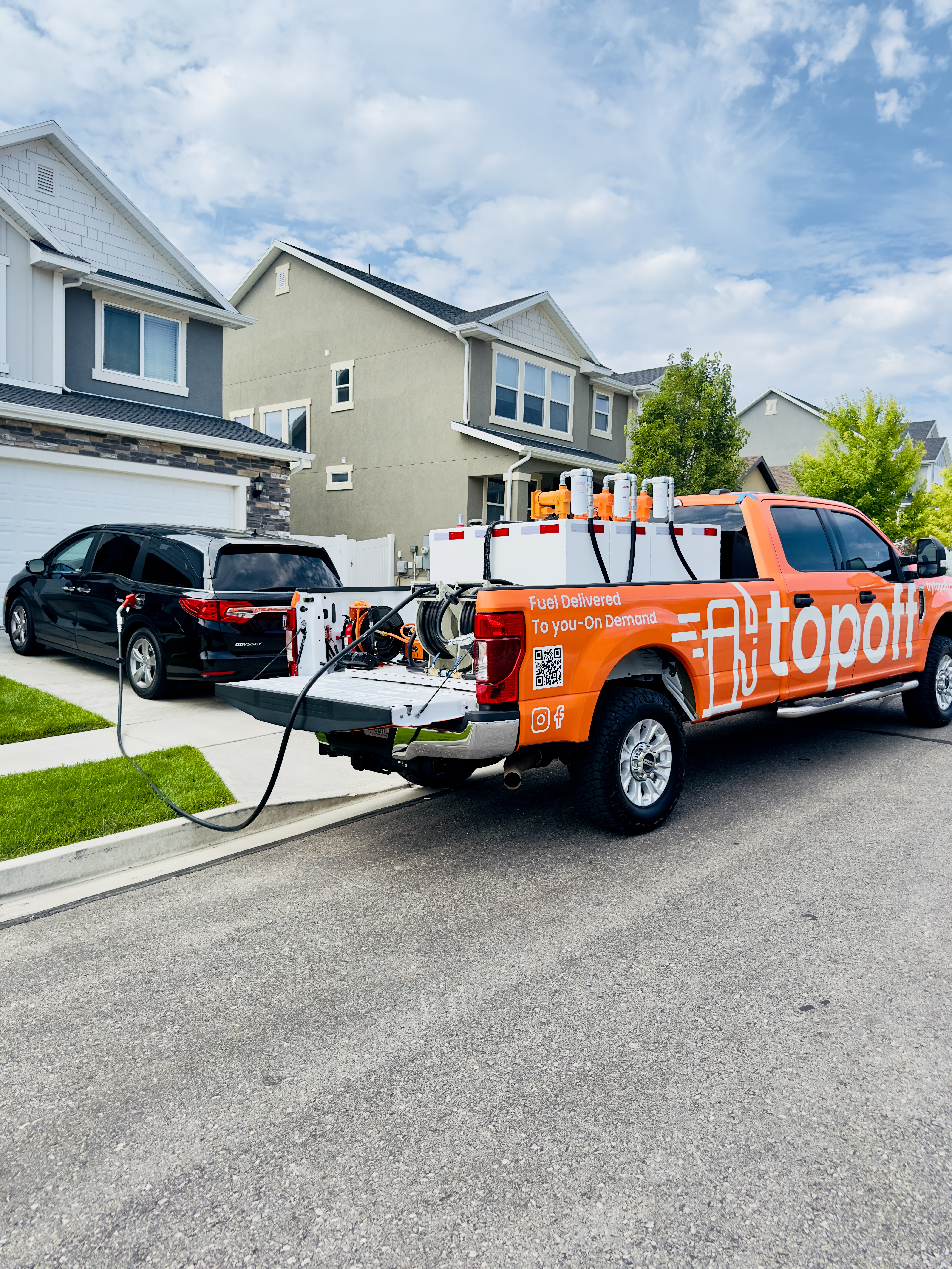 TopOff residential fuel delivery truck at Utah home driveway